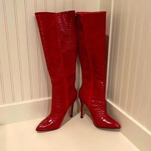 Red knee high stilettos boots